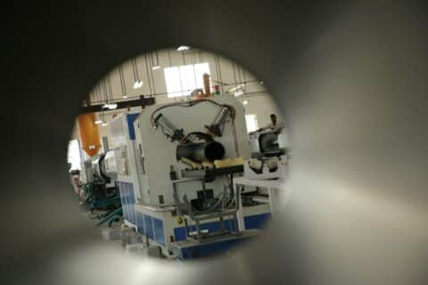 Finished high-density polyethylene pipes, an example of products made through plastics extrusion